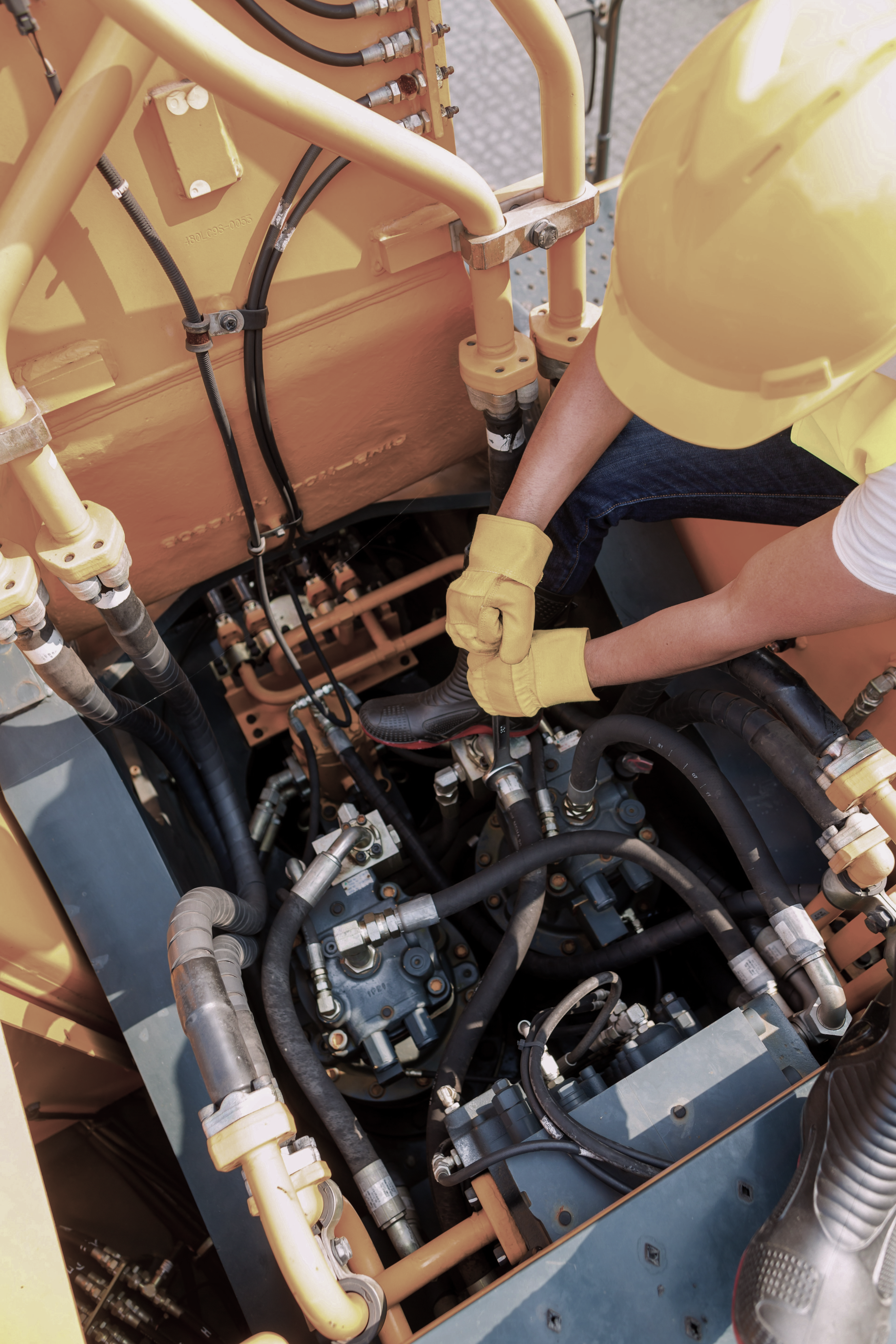 Construction man working on machinery